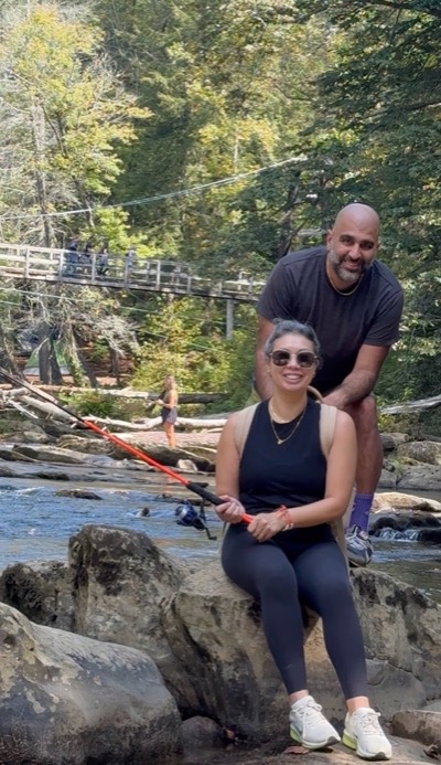 Hesom Parhizkar outdoors by a creek