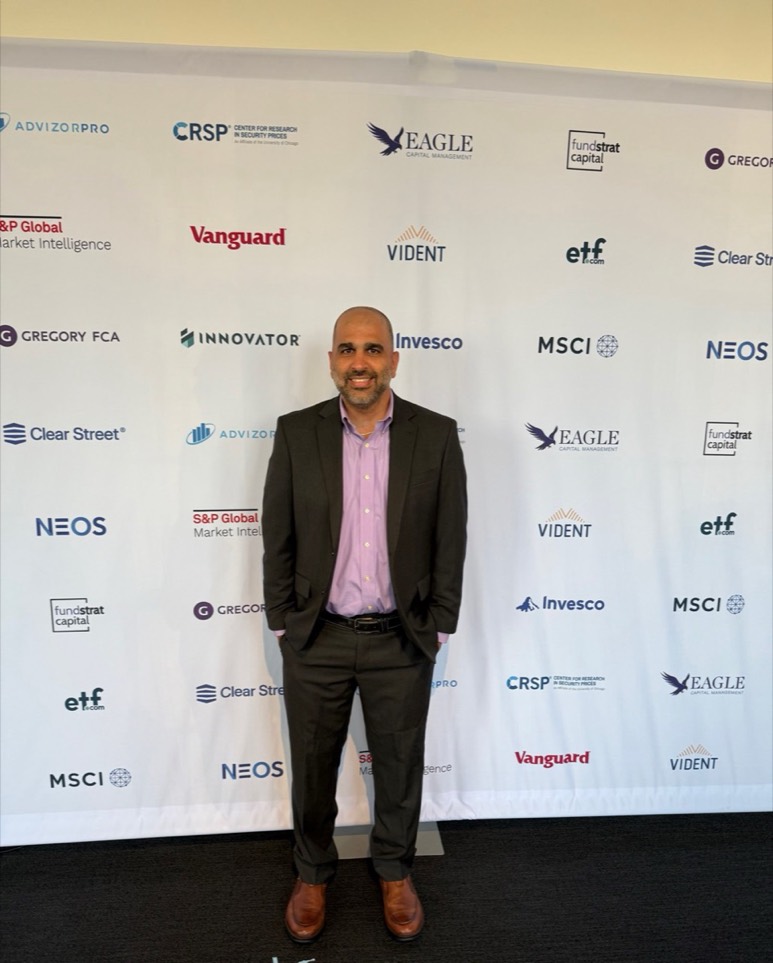 Hesom Parhizkar at a financial services and wealth-tech industry event